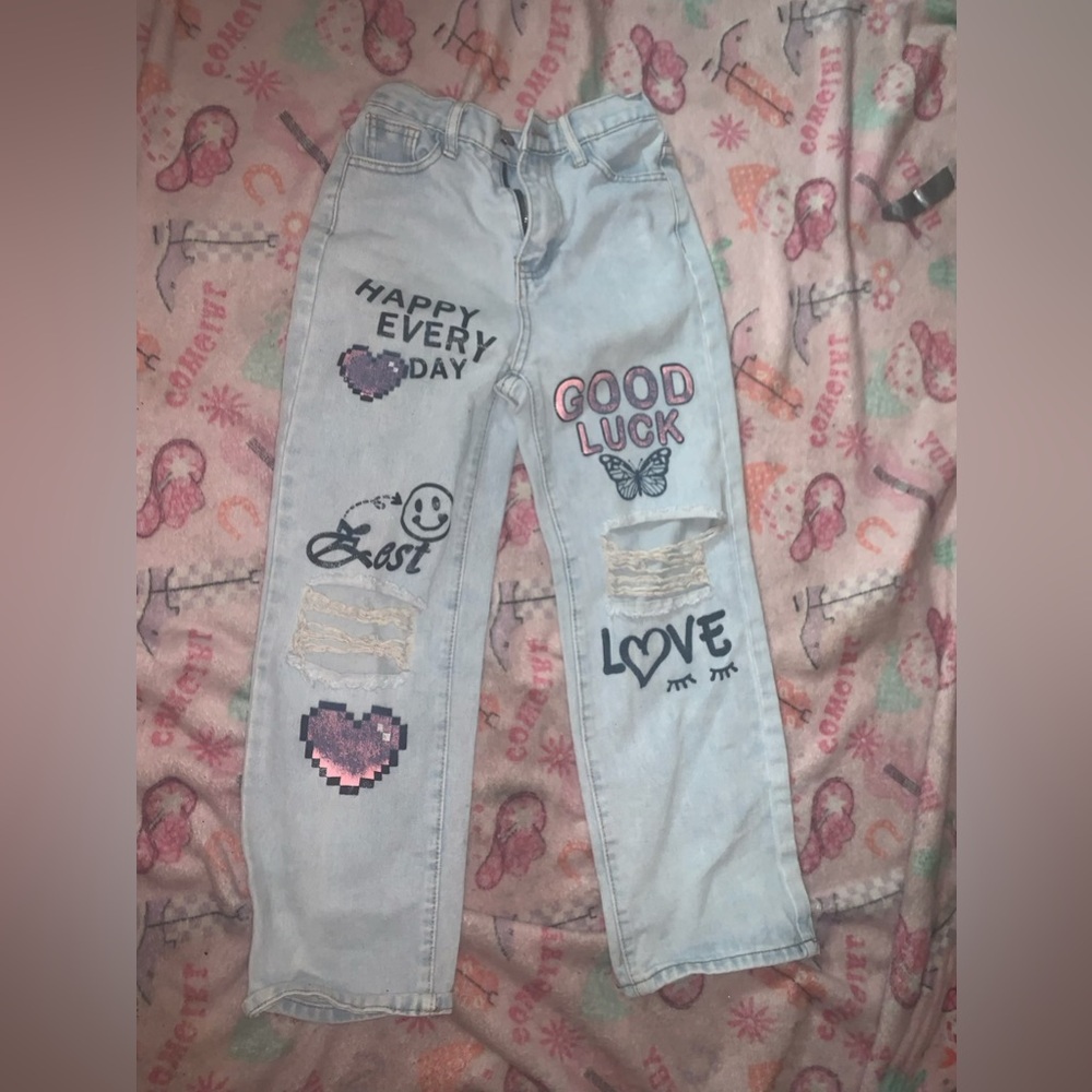 Embroidered Light Blue Jeans with Patches